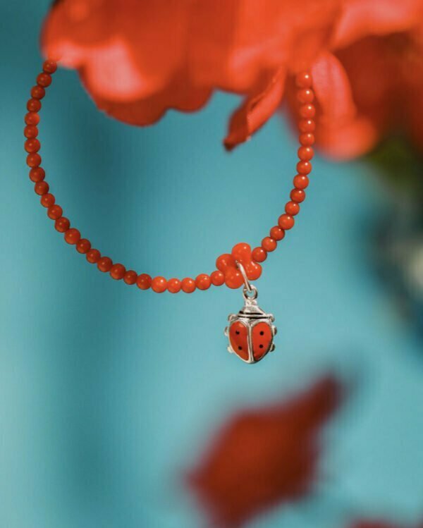 ladybug's day at the beach red coral children's bracelet serenity quartz